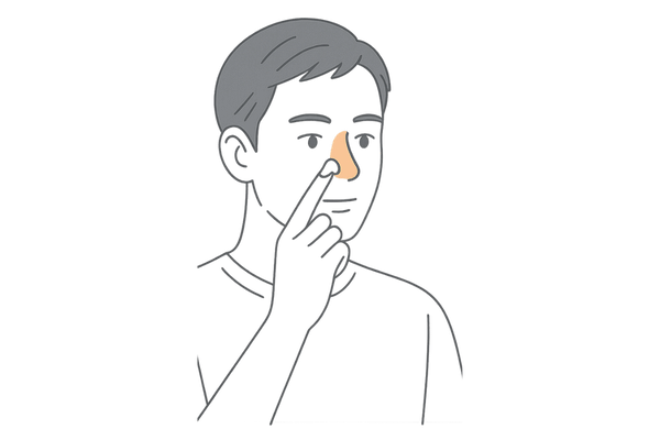 ケトコナゾールを鼻まわりの脂漏性皮膚炎に塗布する男性の説明用イメージ